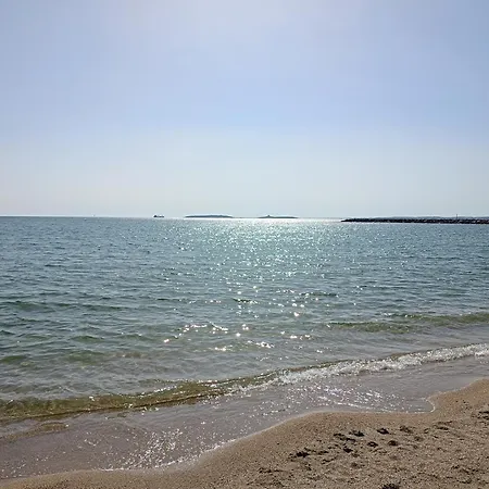 Appartamento Santa Giusta דירה